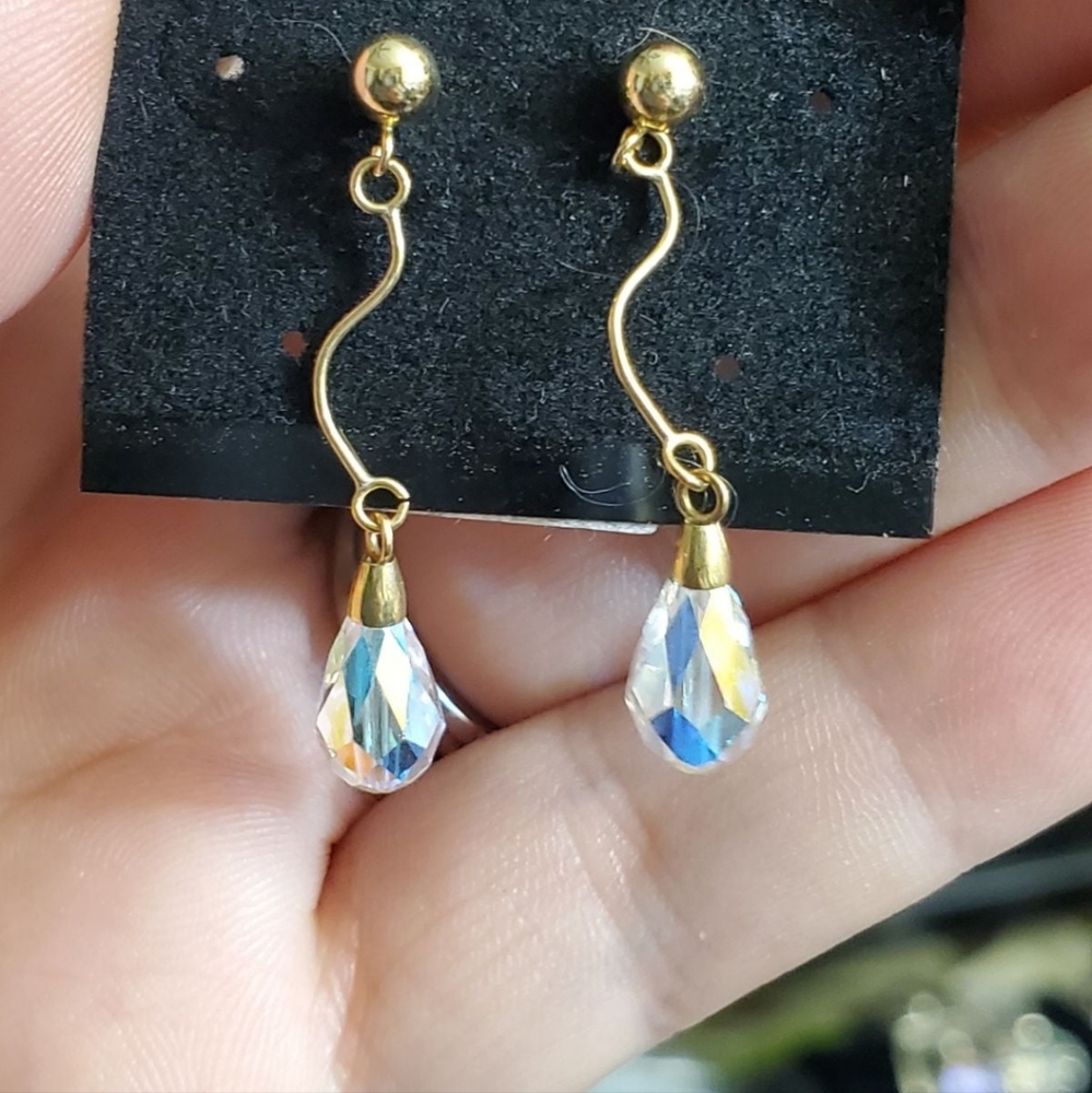 14k dangle earrings! The iridescent glass changes colors based on how the light